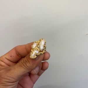 14 k yellow gold small diamond in center and three natural pearls